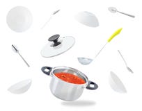 Flying plates and cooking pot with soup stock photography Flying plates and cooking pot with soup stock photography