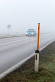 Fog on a road with cars stock image Fog on a road with cars stock image