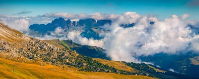Foggy sunny panorama of the Val Gardena valley stock photography Foggy sunny panorama of the Val Gardena valley stock photography