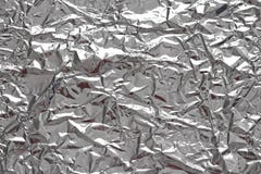 folie Metall skrynklig bakgrund Grå eller silverbakgrund arkivbilder folie Metall skrynklig bakgrund Grå eller silverbakgrund arkivbilder