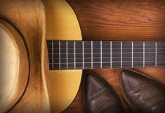 Fondo americano di musica country con gli stivali di cowboy immagine stock libera da diritti Fondo americano di musica country con gli stivali di cowboy immagine stock libera da diritti