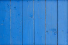 Fondo de madera azul vivo Los tableros verticales pintaron foto de archivo Fondo de madera azul vivo Los tableros verticales pintaron foto de archivo