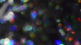 Fondo defocused abstracto de Bokeh de las luces de la Navidad almacen de video Fondo defocused abstracto de Bokeh de las luces de la Navidad almacen de video