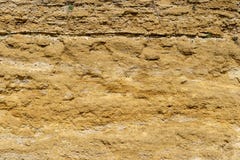 Fondo di pietra di struttura di Brown, calcare, struttura della parete, parete di pietra del vecchio oro marrone, parete di pietr fotografia stock libera da diritti Fondo di pietra di struttura di Brown, calcare, struttura della parete, parete di pietra del vecchio oro marrone, parete di pietr fotografia stock libera da diritti