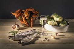 Food, art home. Still life with crayfish dry fish, vodka and boiled potatoes. royalty free stock images Food, art home. Still life with crayfish dry fish, vodka and boiled potatoes. royalty free stock images
