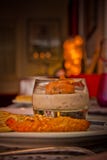 Food served in a glass and in a plate in a cozy atmosphere royalty free stock image Food served in a glass and in a plate in a cozy atmosphere royalty free stock image