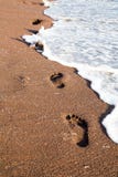 Foot Steps Beach Stock Photo