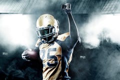 Football player celebrates after scoring a touchdown. stock photography Football player celebrates after scoring a touchdown. stock photography