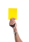 Football referee with whistle holding yellow card on white background royalty free stock image Football referee with whistle holding yellow card on white background royalty free stock image