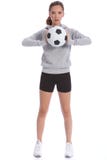 Footballeur grand d'adolescente avec la bille de sports image libre de droits Footballeur grand d'adolescente avec la bille de sports image libre de droits