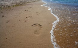 Footprints On The Beach Sand. Stock Photos Footprints On The Beach Sand. Stock Photos