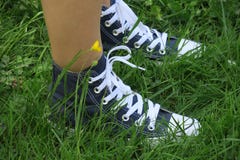 Footwear, White, Shoe, Grass Stock Photography Footwear, White, Shoe, Grass Stock Photography