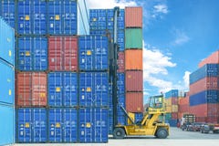 Forklift handling container box loading to truck in import export logistic zone. stock photography Forklift handling container box loading to truck in import export logistic zone. stock photography