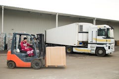 Forklift loader at warehouse