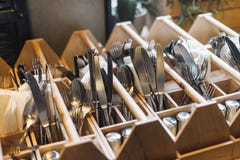 Forks, knifes and spoons in restaurants interior. royalty free stock images Forks, knifes and spoons in restaurants interior. royalty free stock images