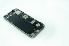 Foto di un telefono cellulare con esposizione rotta Isolato su bianco con lo spazio della copia immagini stock libere da diritti Foto di un telefono cellulare con esposizione rotta Isolato su bianco con lo spazio della copia immagini stock libere da diritti