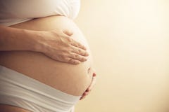 Fotografia da barriga que espera o conceito do bebê fotografia de stock Fotografia da barriga que espera o conceito do bebê fotografia de stock