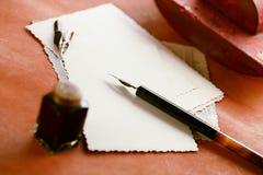 Fotos, tinta del vintage, pluma, papel secante y cámara retros Imagen de archivo libre de regalías Fotos, tinta del vintage, pluma, papel secante y cámara retros Imagen de archivo libre de regalías