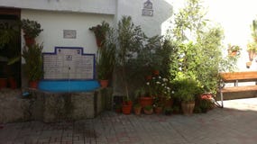 A Fountain in Granada with Poetry and plants royalty free stock images A Fountain in Granada with Poetry and plants royalty free stock images