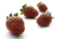 Four bright red strawberries on a white background stock photos Four bright red strawberries on a white background stock photos