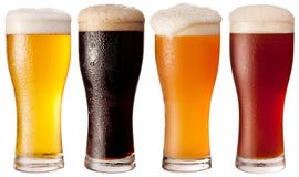 Four glasses with different beers.