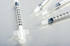 Four Medical Syringes Royalty Free Stock Photography