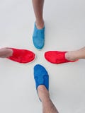 Four pair of diving shoes stock photo Four pair of diving shoes stock photo