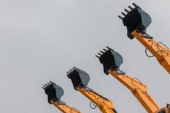 Four Steel Buckets Industrial Machines stock images Four Steel Buckets Industrial Machines stock images