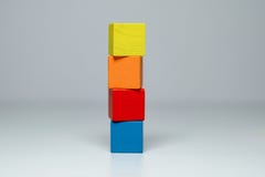 Four wooden childrens blocks of different colors stock images Four wooden childrens blocks of different colors stock images