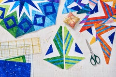 Fragments of quilt, accessories for patchwork, top view royalty free stock images Fragments of quilt, accessories for patchwork, top view royalty free stock images