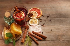 Fragrant mulled wine on a wooden table. Ingredients. Rustic royalty free stock images Fragrant mulled wine on a wooden table. Ingredients. Rustic royalty free stock images