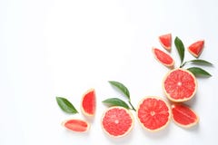 Frame Made Of Grapefruits And Leaves On White Background, Top View. Citrus Fruits Royalty Free Stock Image