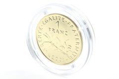 1 franc guld- mynt arkivbild 1 franc guld- mynt arkivbild