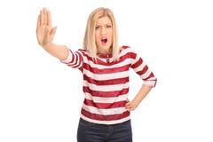 Frau, die ein Stoppschild mit ihrer Hand macht Stockbilder Frau, die ein Stoppschild mit ihrer Hand macht Stockbilder
