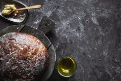 Fresh Baked bread on dark background stock photos Fresh Baked bread on dark background stock photos