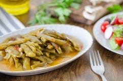 Healthy eating habits.Fresh beans with olive oil and salad on the table. royalty free stock photo Healthy eating habits.Fresh beans with olive oil and salad on the table. royalty free stock photo
