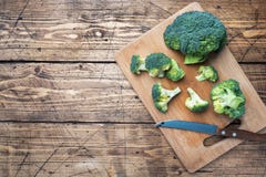 Fresh Broccoli Sliced On A Wooden Cutting Board. Copy Space Stock Photography
