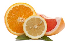 Fresh Citrus Fruits On A White. Stock Image Fresh Citrus Fruits On A White. Stock Image