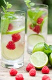 Fresh cold drink water ice cubes peppermint lime raspberry stock photos Fresh cold drink water ice cubes peppermint lime raspberry stock photos