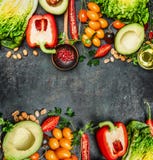 Fresh Colorful Vegetables ingredients for tasty vegan and healthy cooking or salad making on rustic background, top view, frame. Royalty Free Stock Photography Fresh Colorful Vegetables ingredients for tasty vegan and healthy cooking or salad making on rustic background, top view, frame. Royalty Free Stock Photography