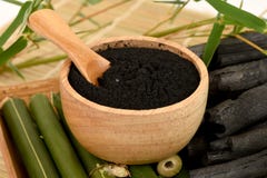 Fresh and dried bamboo and Bamboo charcoal powder. royalty free stock image Fresh and dried bamboo and Bamboo charcoal powder. royalty free stock image