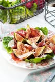 Fresh Fig salad on dark wooden background. stock photos Fresh Fig salad on dark wooden background. stock photos