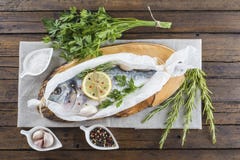 Fresh gilt-head sea bream ready to cook royalty free stock images Fresh gilt-head sea bream ready to cook royalty free stock images