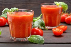 Fresh healthy tomato smoothie juice on wooden background royalty free stock photos Fresh healthy tomato smoothie juice on wooden background royalty free stock photos