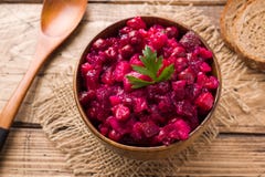 Fresh Homemade Beet Salad Vinaigrette In A Wooden Bowl. Traditional Russian Food Stock Photos