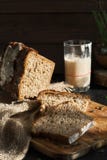 Fresh Homemade Leavened Bread In The Sun, Partially Sliced. Bread Is Located On A Wooden Surface. Hobbies, Baking Rye Bread At Royalty Free Stock Photos Fresh Homemade Leavened Bread In The Sun, Partially Sliced. Bread Is Located On A Wooden Surface. Hobbies, Baking Rye Bread At Royalty Free Stock Photos