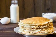 Fresh homemade stack of crepes with ingredients royalty free stock images Fresh homemade stack of crepes with ingredients royalty free stock images