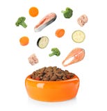 Fresh ingredients falling into bowl with dry pet food royalty free stock photos Fresh ingredients falling into bowl with dry pet food royalty free stock photos