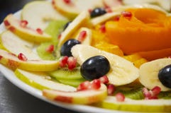 Fresh Juicy Fruit Salad On A Plate. Stock Photos