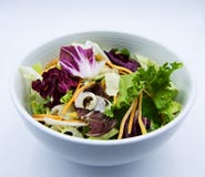 Fresh leaf salad in bowl on white background stock photo Fresh leaf salad in bowl on white background stock photo